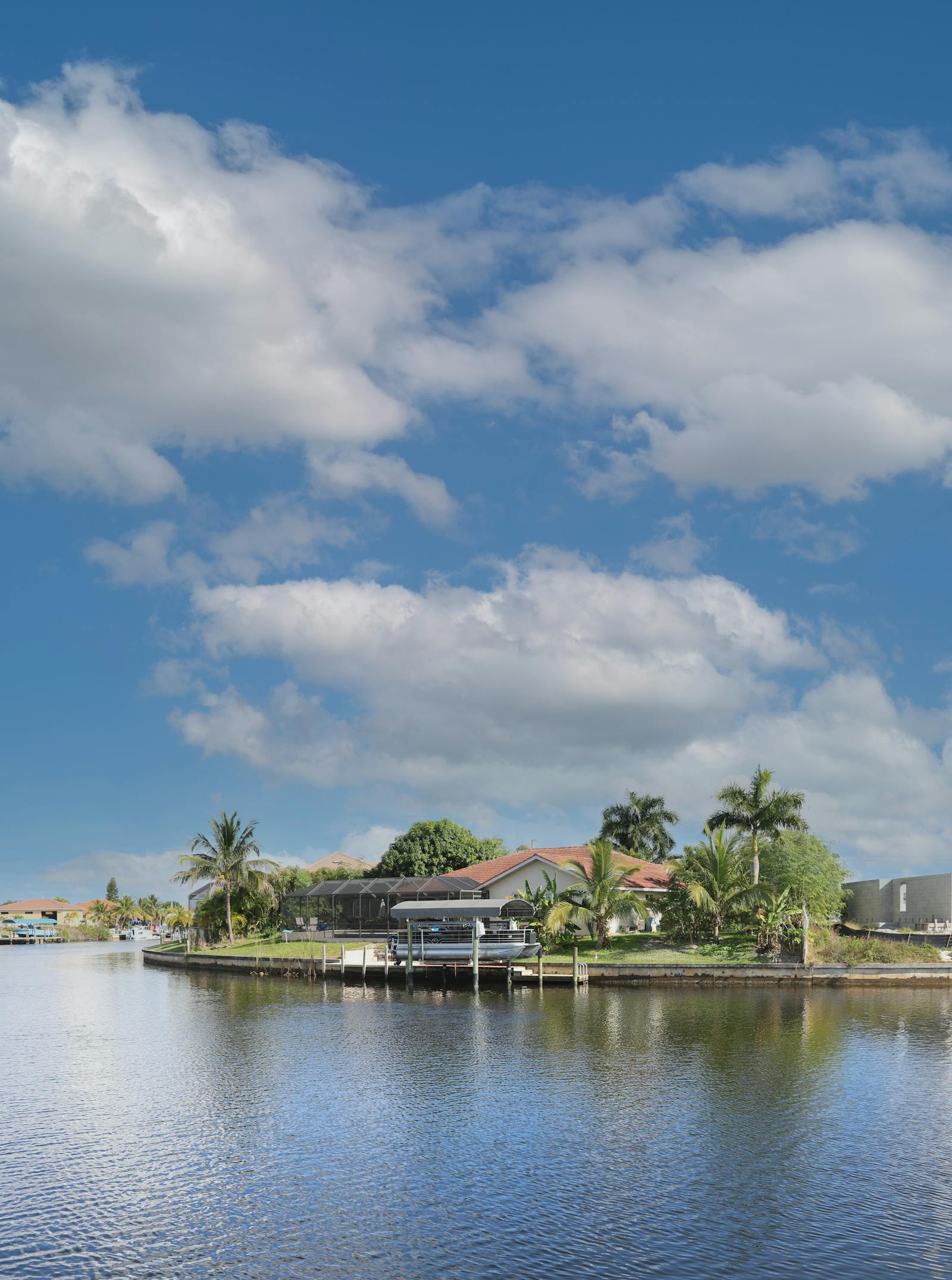 Aerial view of Cape Coral canals and waterfront homes in Lee County, Florida.